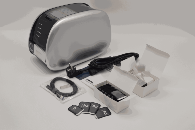IDEN-CR01 package contents — scanner, power cord, USB cable, image plates, accessories