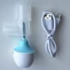 VBA1 apnea alarm main unit shown with its USB charging cable