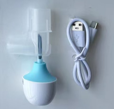 VBA1 apnea alarm main unit shown with its USB charging cable