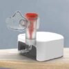 VCN2 veterinary nebulizer with nebulizer cup and animal face mask attached