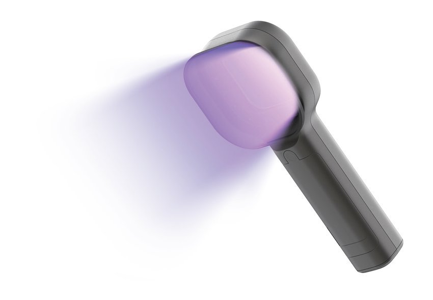 VW1 Wood's lamp emitting ultraviolet light through the lens head